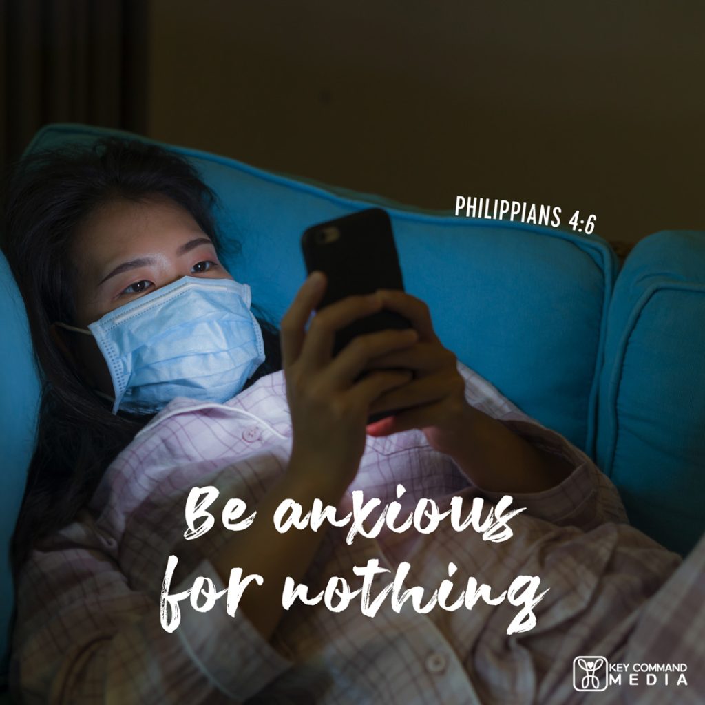 A girl lays on a couch in the dark wearing a face mask lit only by the light from her phone, with Philippians 4:6, "Be anxious for nothing."