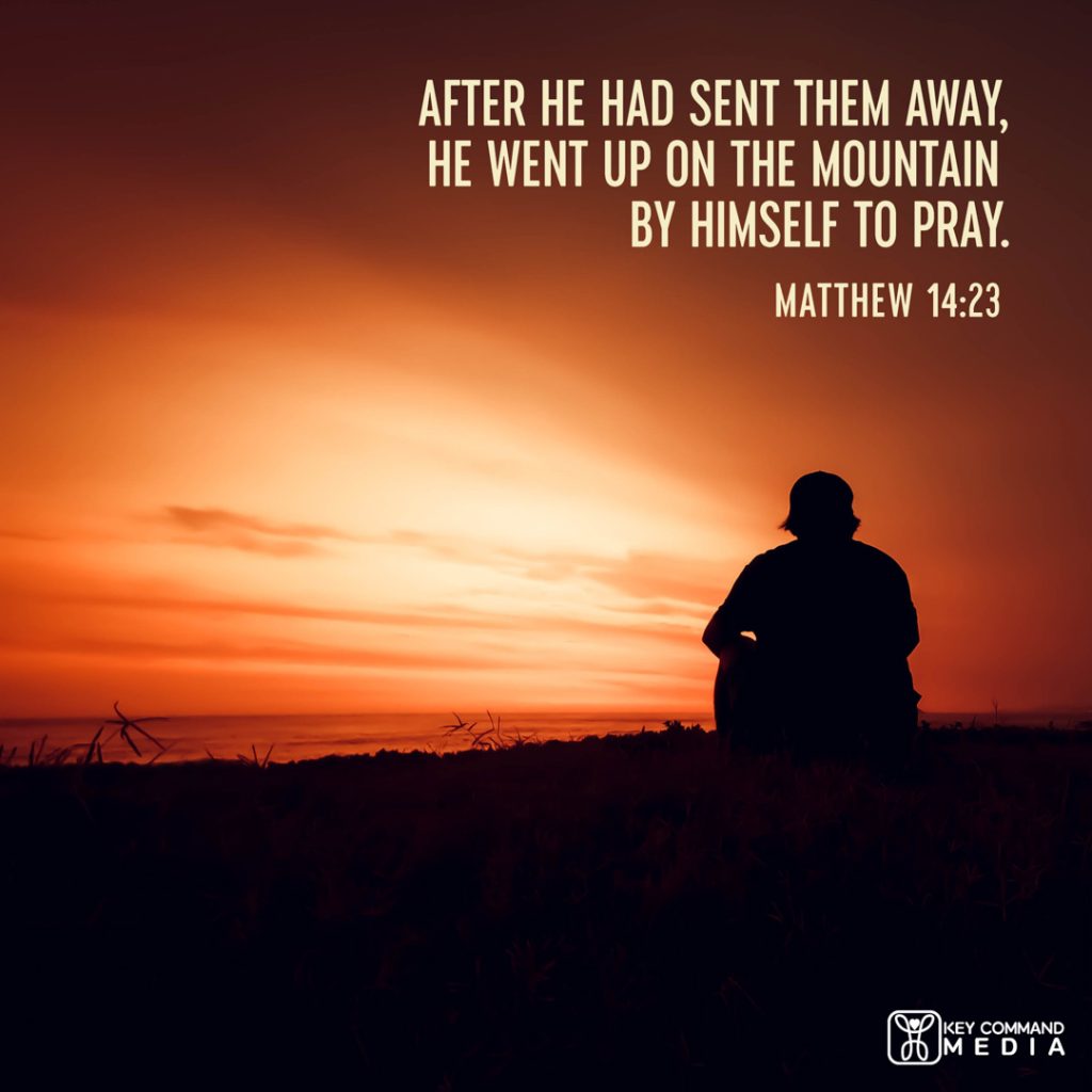 A silhouetted man sits on the hillside near a lake watching the last of the setting sun with Matthew 14:23, "After He had sent them away, He went up on the mountain by Himself to pray."