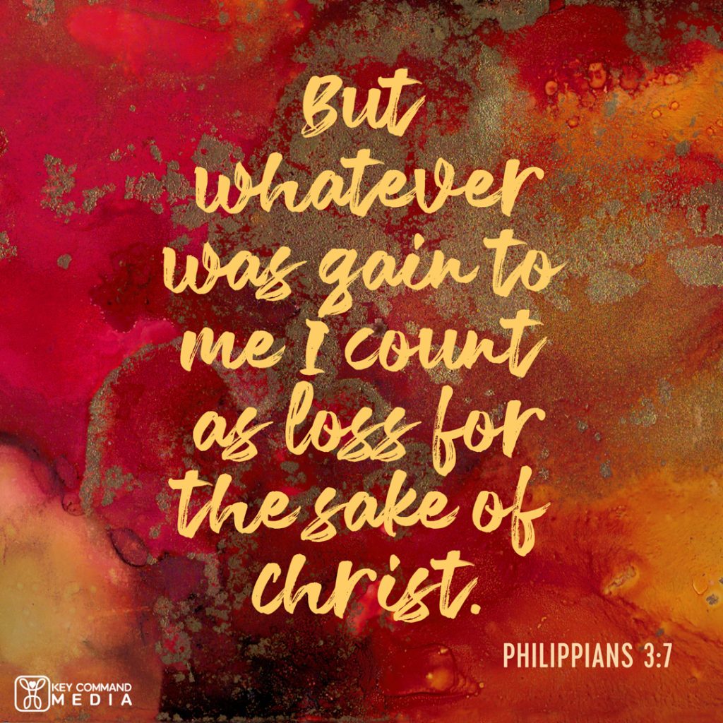 A paint canvas with various shades of red, orange and tan with Philippians 3:7, "But whatever was to me I count as loss for the sake of Christ."