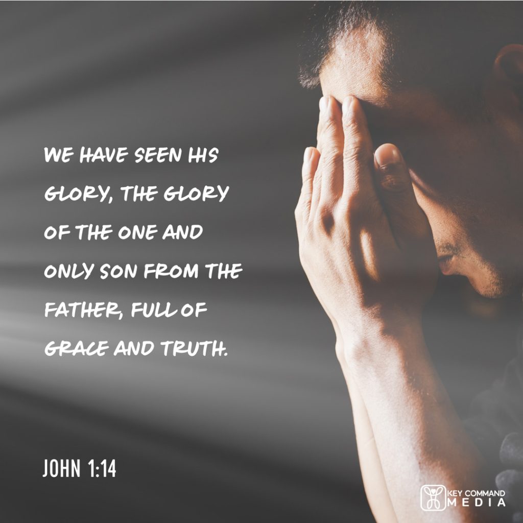A man bows his head in prayer as a light washes over him and he shades his eyes with John 1:14, "We have seen his glory, the glory of the one and only Son from the Father, full of grace and truth."