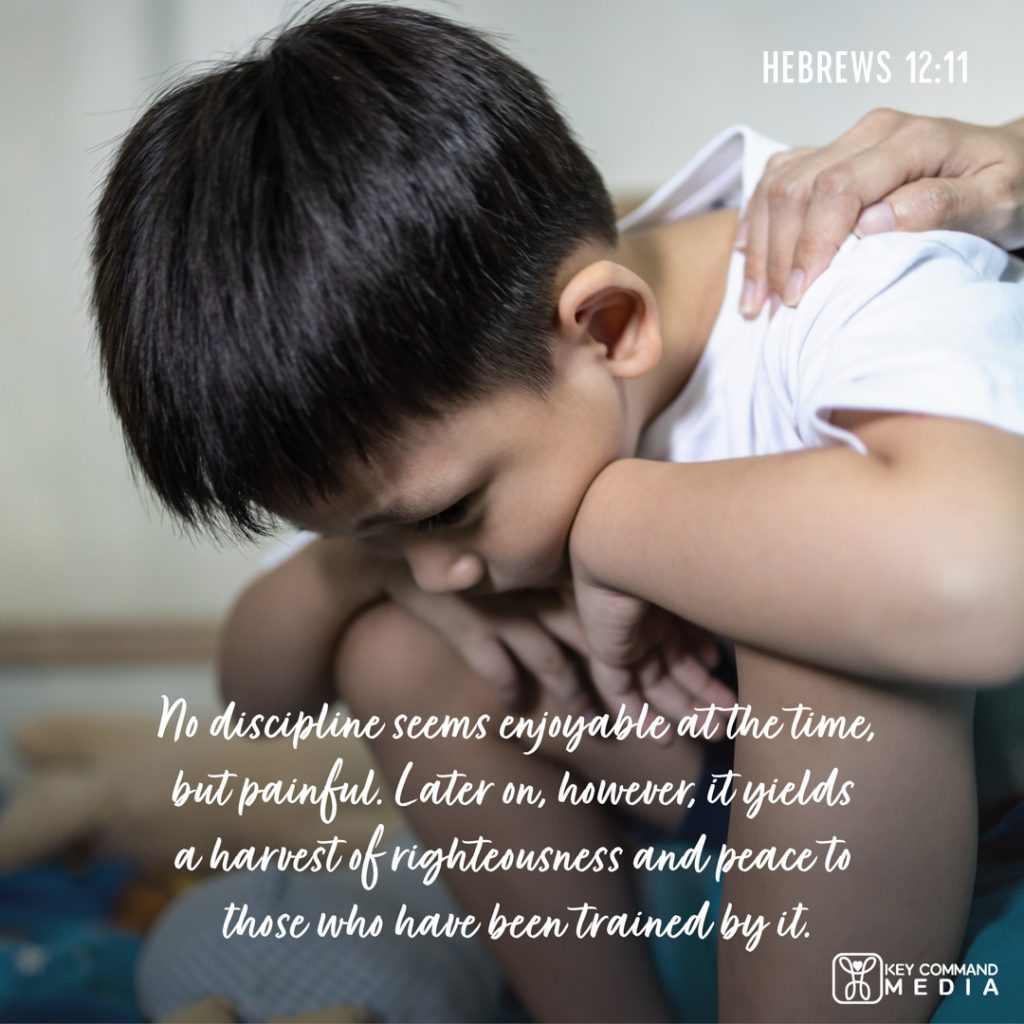 A young boy sits with his face and arms resting on his knees looking downward with a woman's hand on his shoulder with Hebrews 12:11, "No discipline seems enjoyable at the time, but painful. Later on, however, it yields a harvest of righteousness and peace to those who have been trained by it."