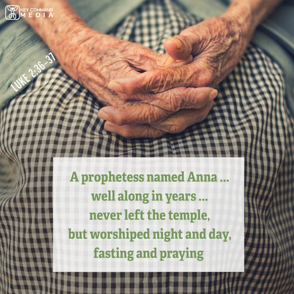 A very old woman's hands are folded in prayer on her lap with Luke 2:36-37, "A prophetess named Anna...well along in years...never left the temple, but worshiped night and day, fasting and praying."
