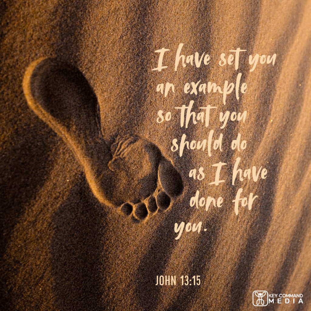 A footprint in the sand with John 13:15, "I have set you an example so that you should do as I have done for you."